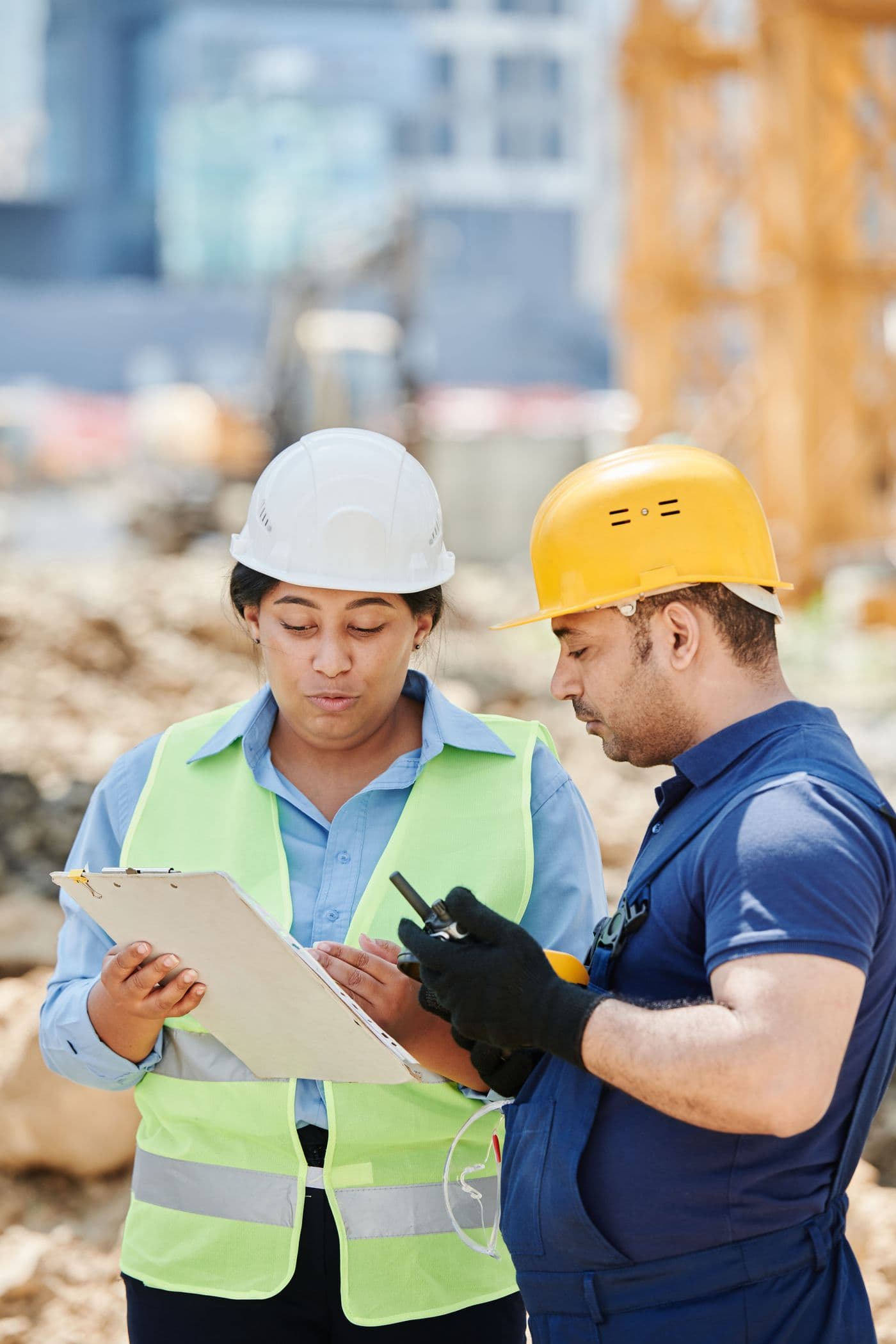 Two members of the team reviewing a project on site